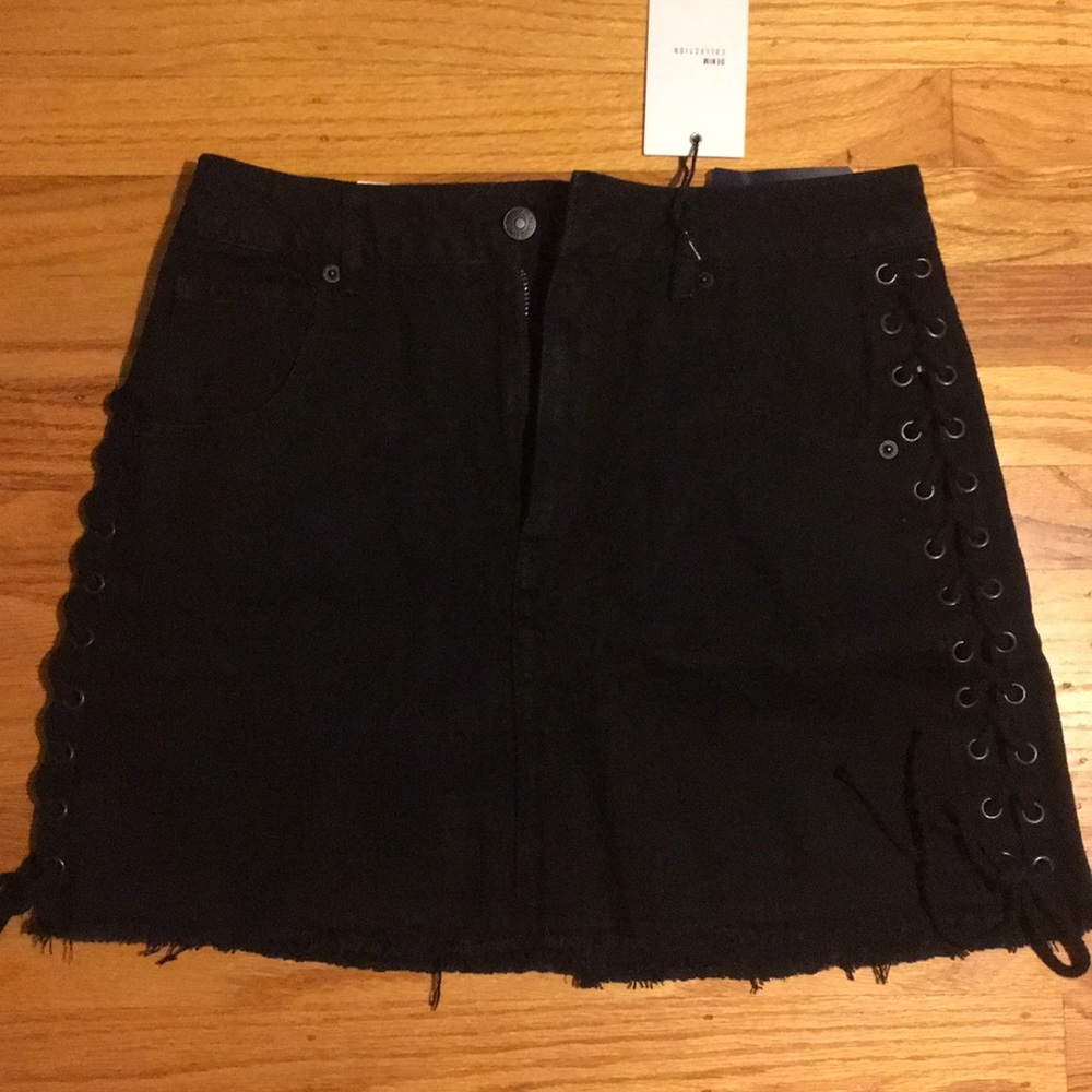 Black denim mini skirt